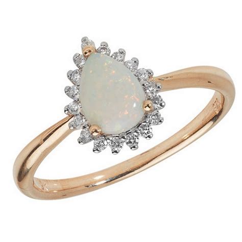 Engagement ring with 1/2 carat tw of diamonds in 10ct yellow & white gold. Diamond and Pear Shaped Opal Cluster Ring in 9ct Yellow ...