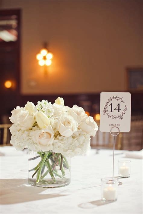 If you want a flowers only centerpiece, take a look at this one. Gold White Austin Wedding from The Nichols | Wedding table ...