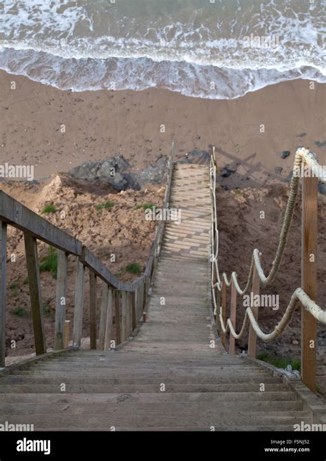 A Steep Staircase Traverses An Unstable Cliff Side To Get People Down