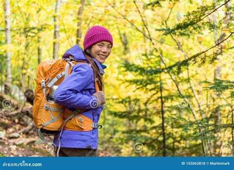 Happy Backpacker Girl Hiking In Autumn Forest Young Asian Hiker Woman