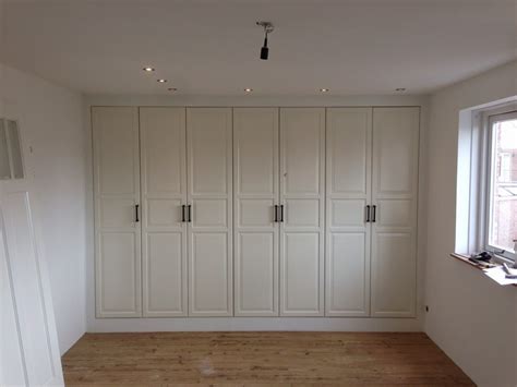 Ikea brimnes three door wardrobe dimensions drawings. Fully functional IKEA fitted wardrobe for sloping ceiling ...