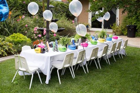 Daisies picked from the meadow are dancing around the plates. Kara's Party Ideas Two-A-Saurus Dinosaur Garden Party ...