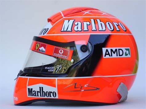 As michael schumacher makes a slow recovery from a traumatic brain injury, following a serious skiing accident in the french alps, attention is being given to his helmet mounted gopro. Michael Schumacher-CM Helmets-Michael Schumacher 2004 F1 Replica Helmet