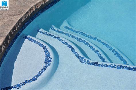 Pebble Tile Stair Markers On An Entryway To A Pool By Monogram Custom