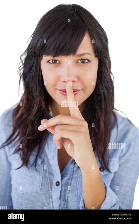 Brunette Putting Finger On Her Mouth For Silence Stock Photo Alamy