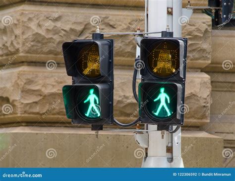 Green Man Light At A Pedestrian Crossing At The Street Stock Photo