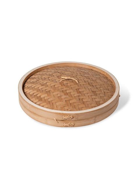 A Round Bamboo Tray With Handles