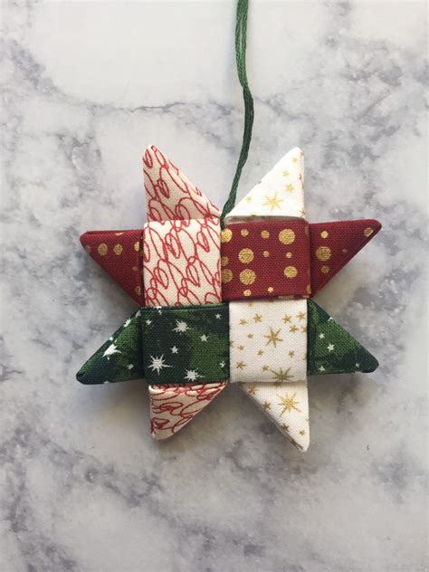 Material Folded Christmas Star To Make Origami