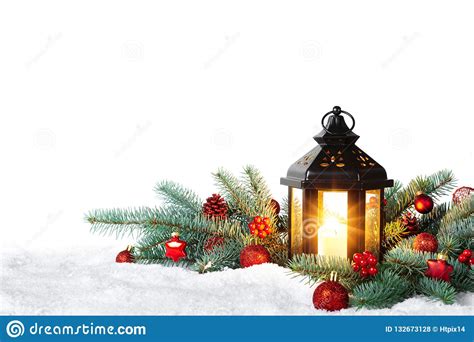 Christmas Lantern On Snow With Fir Branch Isolated On