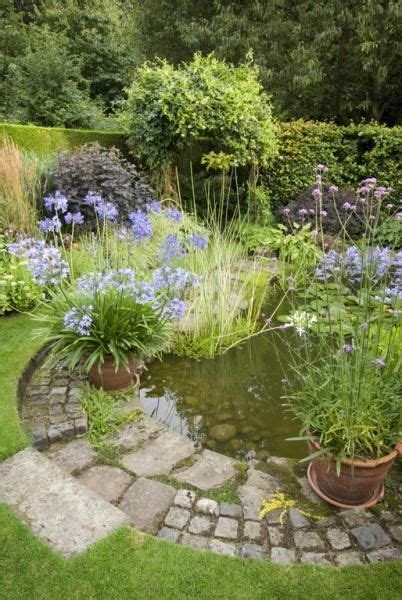 Pond With Sloping Access For Creatures Yet Structured To Look Good In