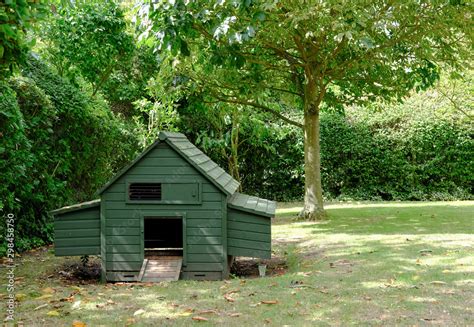 Small Chicken Coop Seen Erected Within A Domestic Garden As Seen In Mid Summer Stock Photo