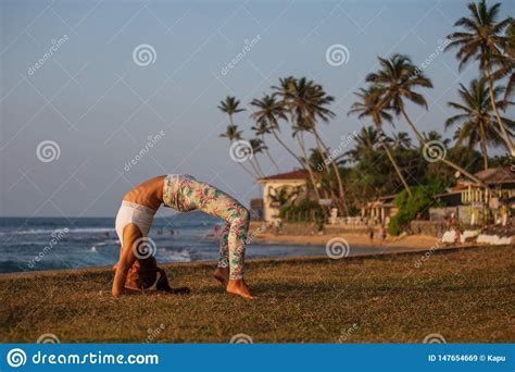 Caucasian Woman Practicing Yoga At Seashore Of Tropic Ocean Stock Image Image Of Body Energy