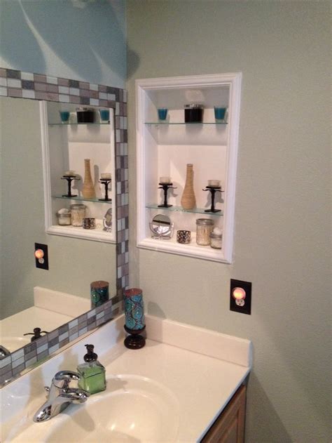 A diy medicine cabinet solution. Framed medicine cabinet & tile around standard mirror ...