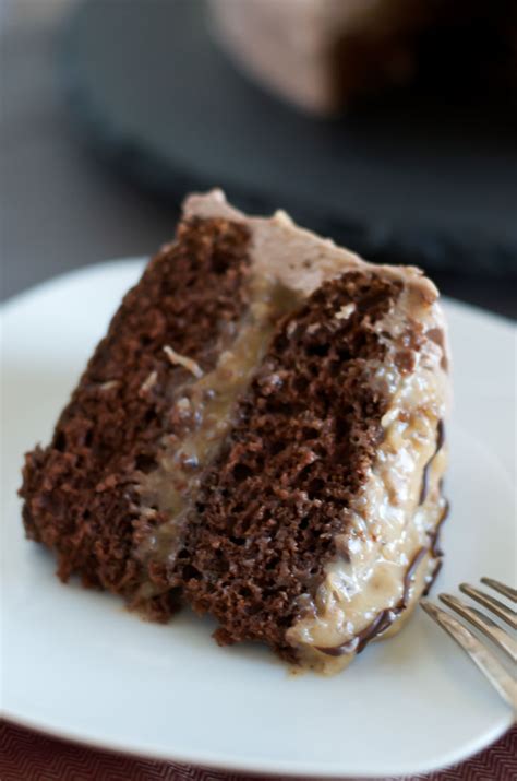 This german chocolate cake has a gooey coconut and toasted pecan filling, a dark chocolate cake, and deliciously creamy chocolate buttercream on top! Best German Chocolate Cake Recipe - Delights Of Culinaria