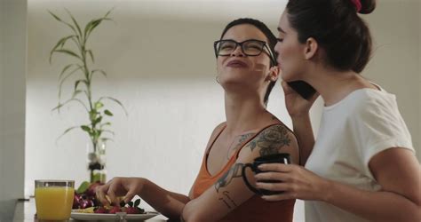 Lesbians Eating Food Talking On Telephone Stock Footage SBV
