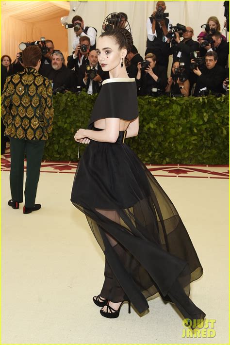 Lily Collins Carries Rosary Beads On Met Gala 2018 Red Carpet Photo