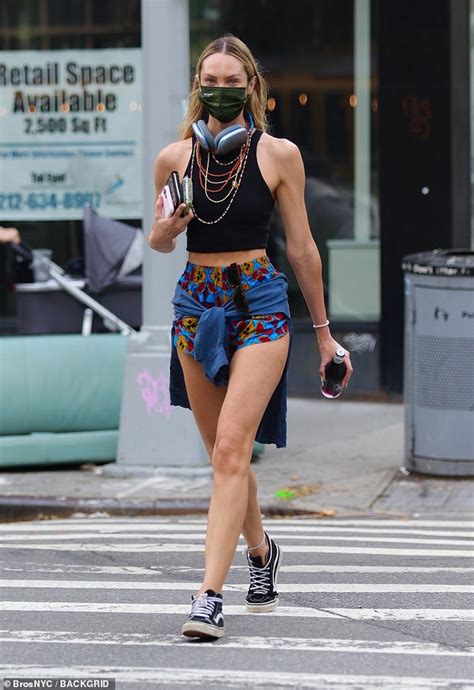 Candice Swanepoel Shows Off Her Model Legs In Tiny Floral Shorts While Out And About In New York