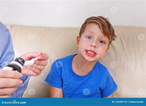 The Boy Is Sick Mom Treats Drugs Stock Photo Image Of Little Girl