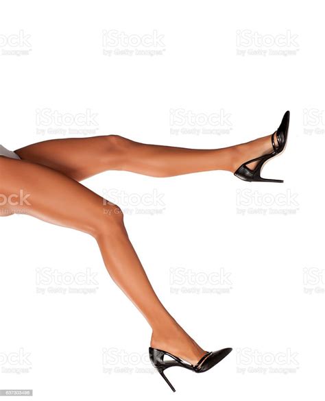 Elegant Beautifully Shaped And Cared Womans Legs In Black Shoes Stock