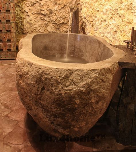 20 Bathroom Designs With Stunning Stone Tubs