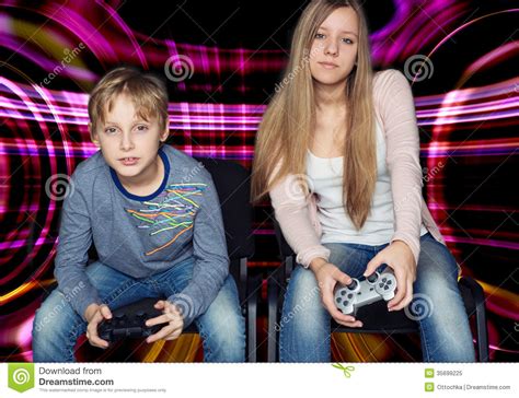 Boy And Girl Playing Video Games Stock Image Image Of