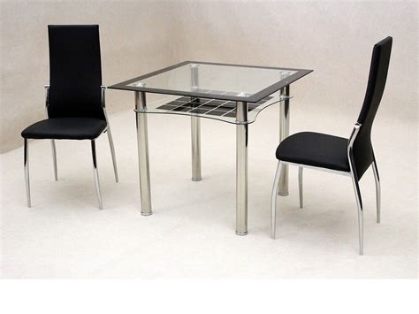 Dining tables come in all shapes and sizes depending on how you want to enjoy meals and decorate your home. Small square glass dining table and 2 chairs - Homegenies