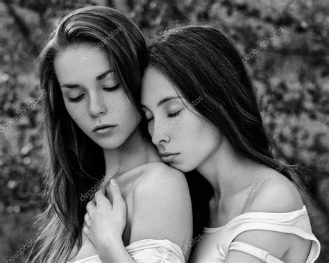 Dramatic Portrait Of A Girl Portrait Of Two Beautiful Girls In The Woods Stock Photo By