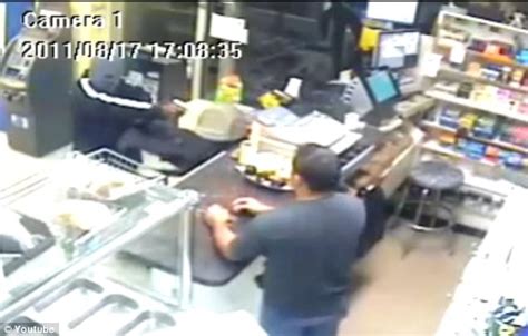 Dramatic Moment Brave Machete Wielding Store Clerk Fights Off Robber After He Shot At Him With