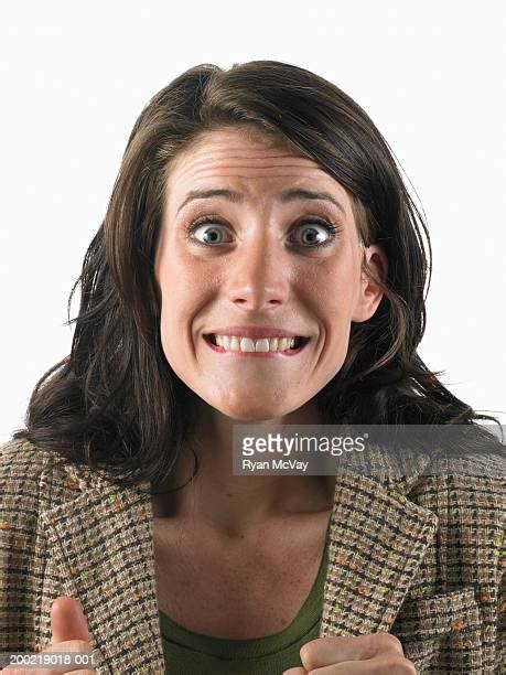 Woman Biting Lip Nervous Photos And Premium High Res Pictures Getty