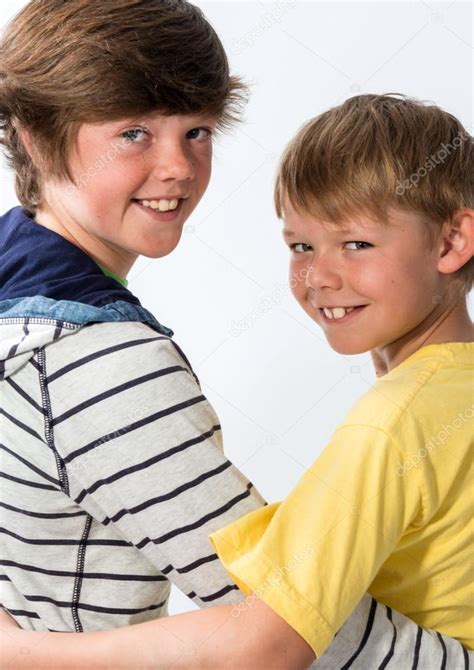 Two Young Brothers Posing — Stock Photo © Fotomicar 26229267