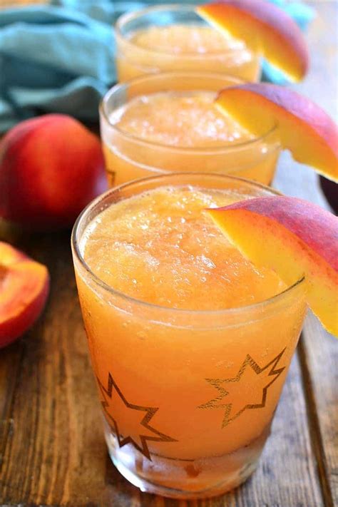 Frozen Peach Slush Recipe Slush Recipes Alcohol Drink Recipes Frozen Drinks