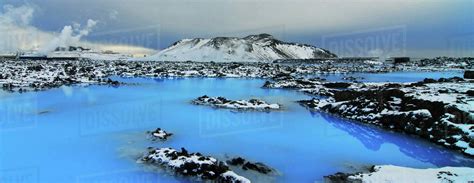 Iceland Blue Lagoon Vibrant Blue Lake Surrounded By Rocky Lava Field