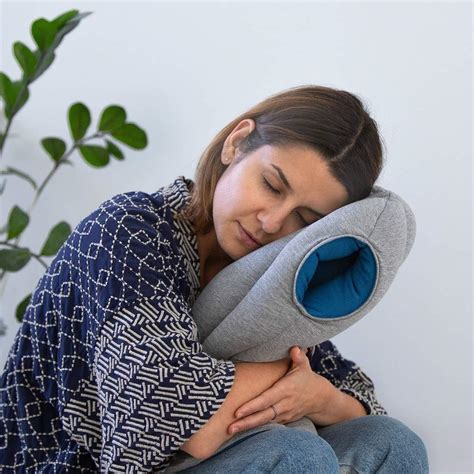 Nap in subtle comfort with the ostrich pillow mini, the next in a line of increasingly small oddball pillows designed for the perfect casual snooze. Ostrich pillow-portable nap micro environment - scenarir