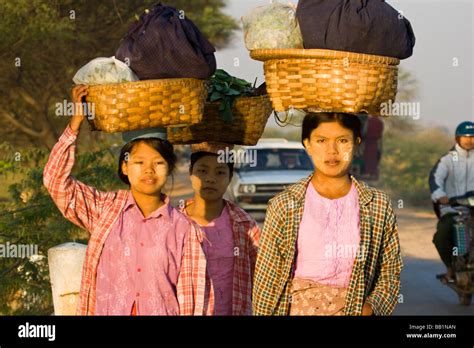 Burmese Women Carrying Baskets On Heads Remote Area Outside Of Make