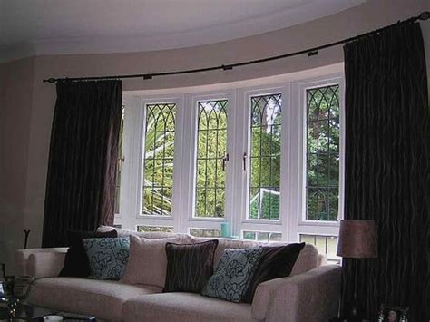 Any type of shades work well in bay windows. Ideas For Bay Windows About Modern Rhextrmus Curtain Rods ...