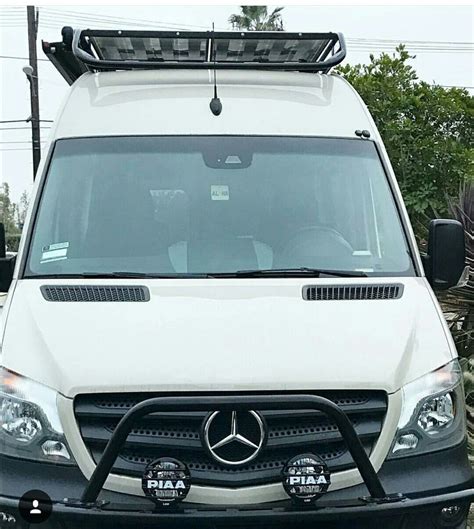 Mercedes Sprinter Van With Aluminess Roof Rack And Front Light Bar