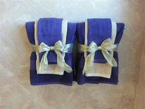 This is one of many bathroom. Decorative bathroom towels in purple and gold theme ...