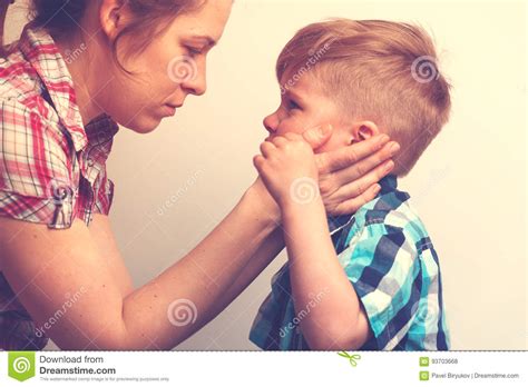 Young Mother Comforting Her Little Crying Child Stock Photo Image Of