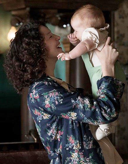 Starz Has Released A New Photo Of Claire Caitriona Balfe Holding Baby