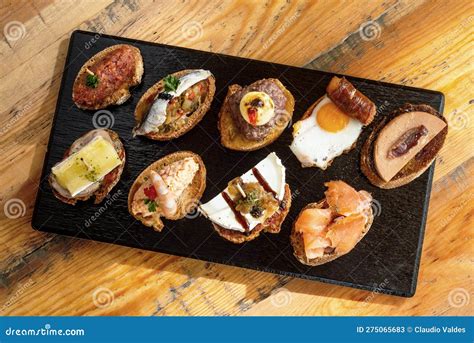 Slate Table Of Spanish Tapas Or Pintxos Stock Image Image Of Snacks Wood 275065683