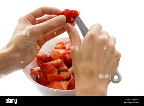Womans Hands When Cutting Strawberries Stock Photo Alamy
