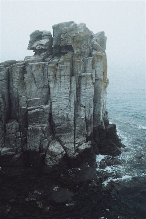Gray Rock Formation On Sea · Free Stock Photo