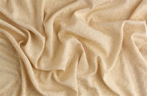 Premium Photo Beige Satin Textile Fabric With Embroidery Elements