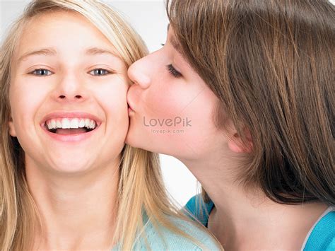 sisters kissing cheeks picture and hd photos free download on lovepik