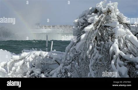 Niagara Falls Frozen Over Covered In Ice During Freezing Cold Winter