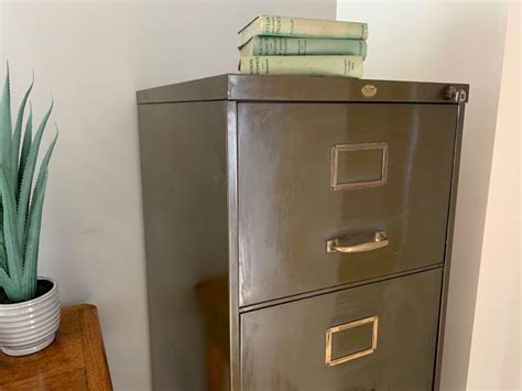 Tall eeka file cabinet with locking tambourd door and stacking birch drawers inside. Mid Century 4 Drawer Steel Filing Cabinet by Art Metal (2 ...