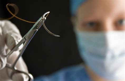 Surgeon Ready To Suture Stock Photo Download Image Now Istock