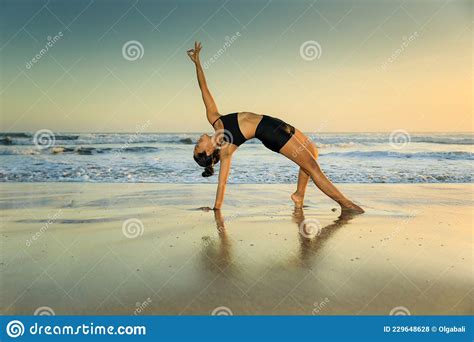 Yoga Retreat Beautiful Asana Slim Woman Practicing Yoga On The Beach