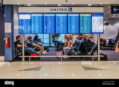 United Airline Flight Information Display Panel Inside Chicago Ohare International Airport