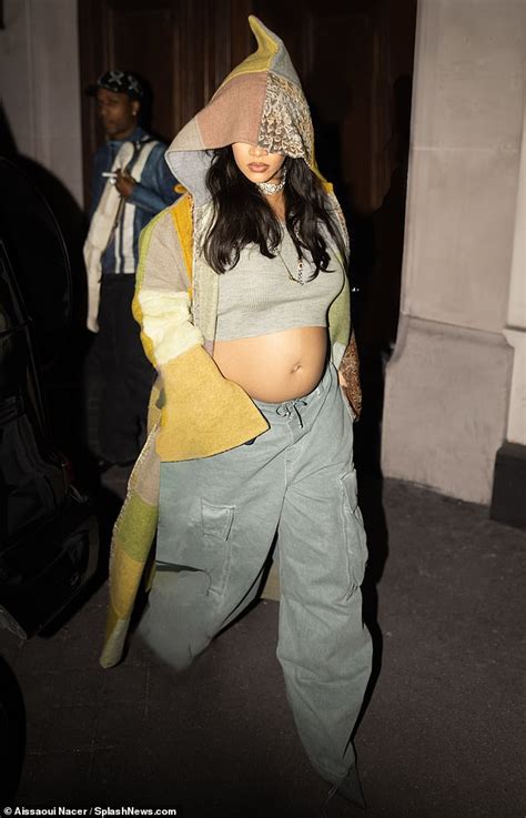 pregnant rihanna flaunts her bump in a crop top and quirky hoodie as she dines with beau a ap